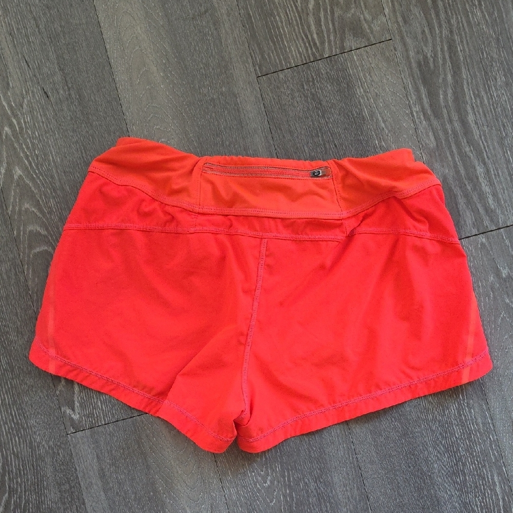 Athleta Ready Set Neon Orange Running Shorts - Picture 3 of 5